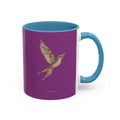 A ceramic mug with a deep purple exterior, a light blue handle and interior, and a detailed illustration of a flying bird on the front. The text 'Ants forgotten' is printed near the bottom.